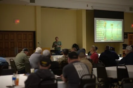A presenter speaking to West Virginia Paving crews at Return to Work Readiness 2026